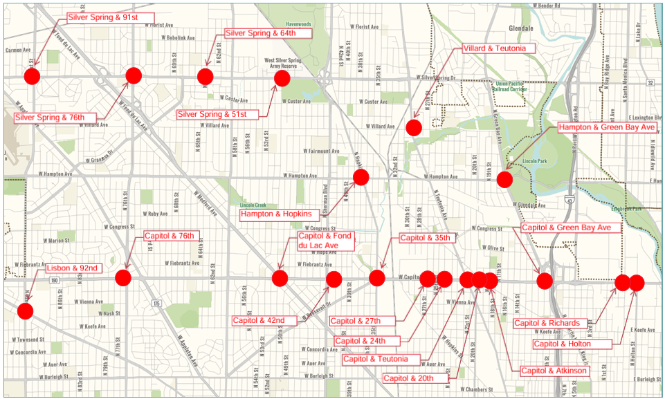Map of the Milwaukee street network highlighting priority intersections for LED retrofits with red dots. 